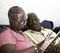 A couple using a tablet