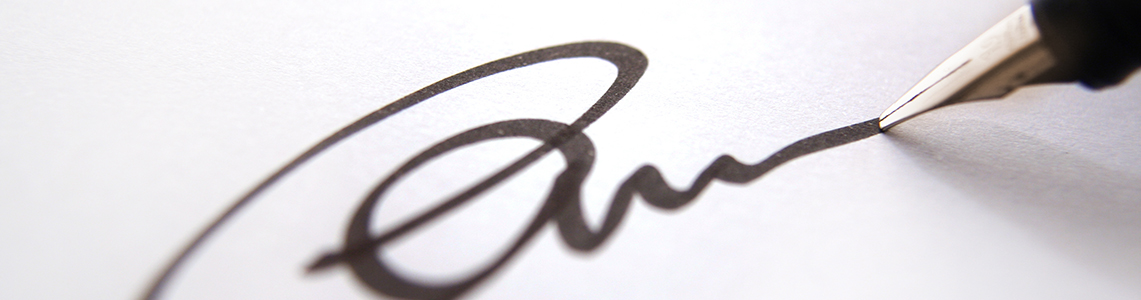 A signature and pen